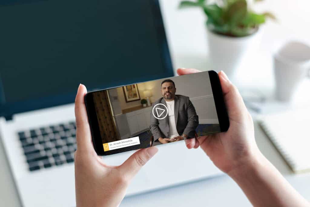 Mockup of a phone playing a Missouri Coalition for Oral Health video